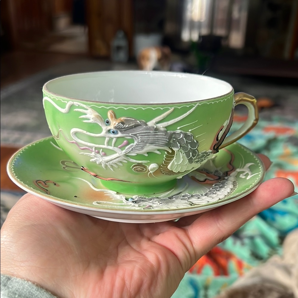 Vintage Green and White Ceramic Teacup with Dragon Design